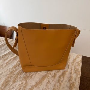 Brand new faux leather bag; caramel color